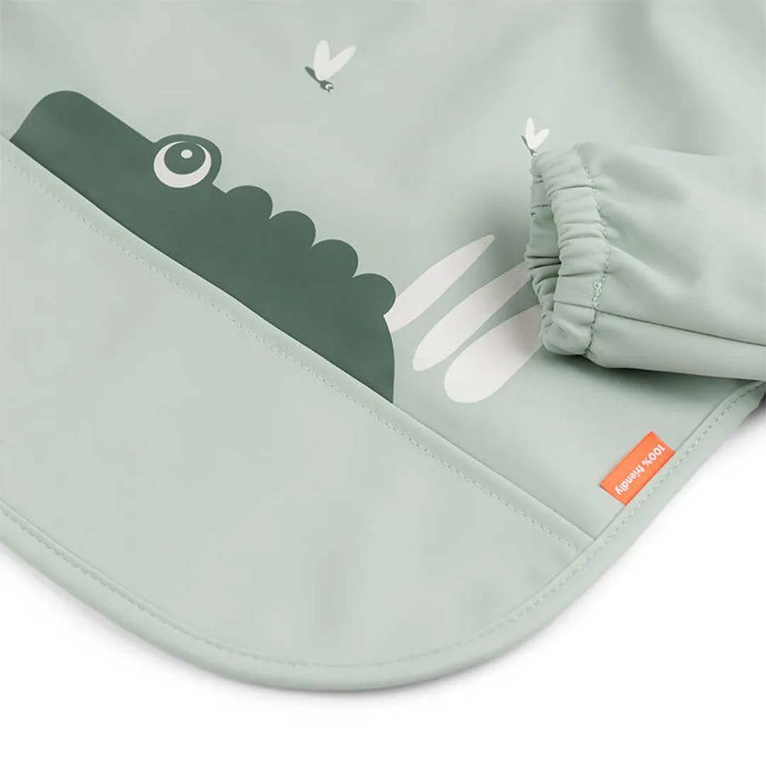 Done by Deer Sleeved Pocket Bib - Green - Croco